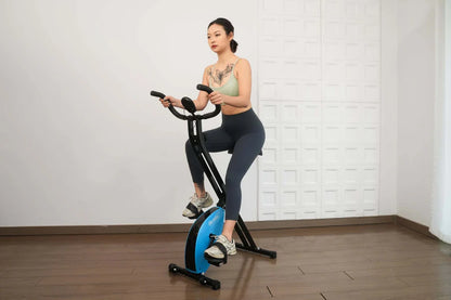 Foldable exercise bike with multiple resistance levels.
