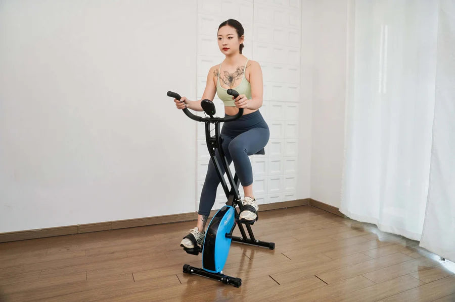 Foldable exercise bike with multiple resistance levels.