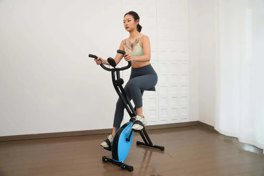 Foldable exercise bike with multiple resistance levels.